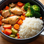 **Chicken Stew Meal Prep:** A vibrant, appetizing photo showcasing a container of chicken stew with colorful vegetables and perfectly cooked rice. Focus on highlighting the fresh ingredients and the convenience of a ready-to-eat meal.
